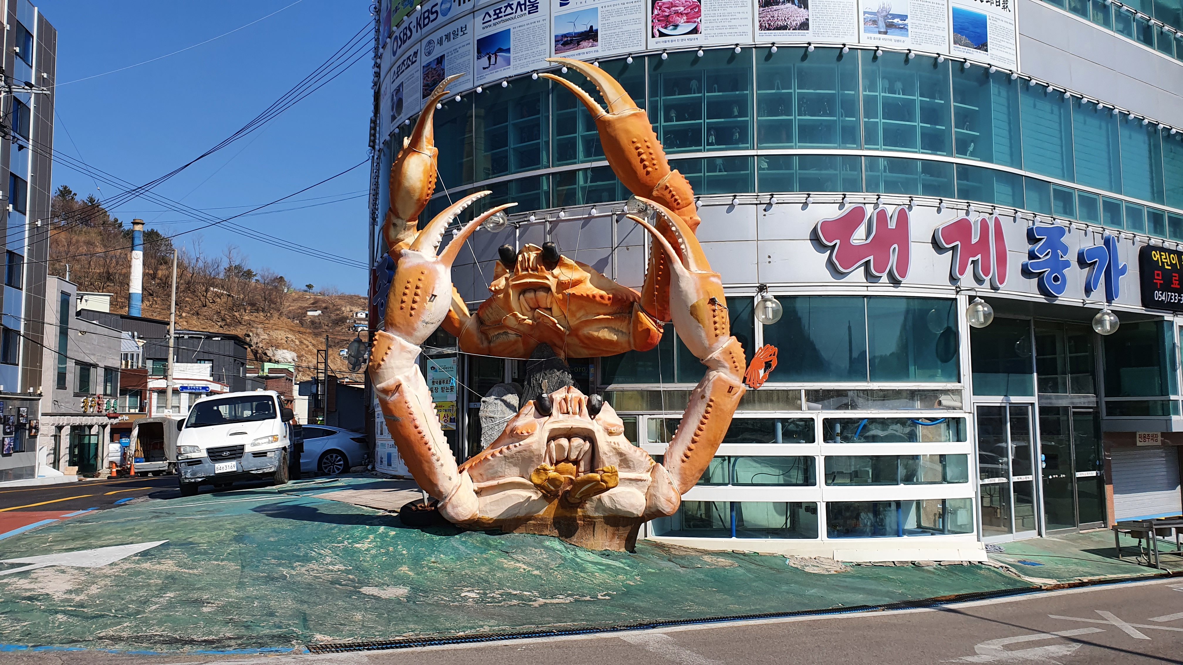 Crab statues outside restaurant in Yeongdeok Crab Village
