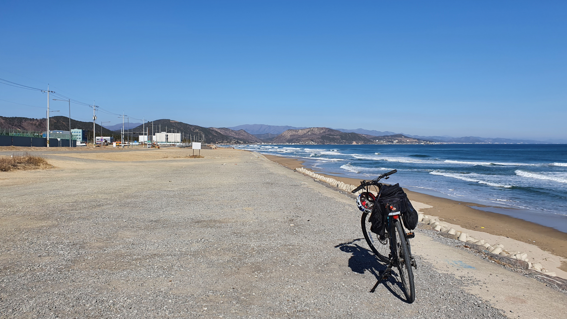 Bicycle with saddle bag on beach