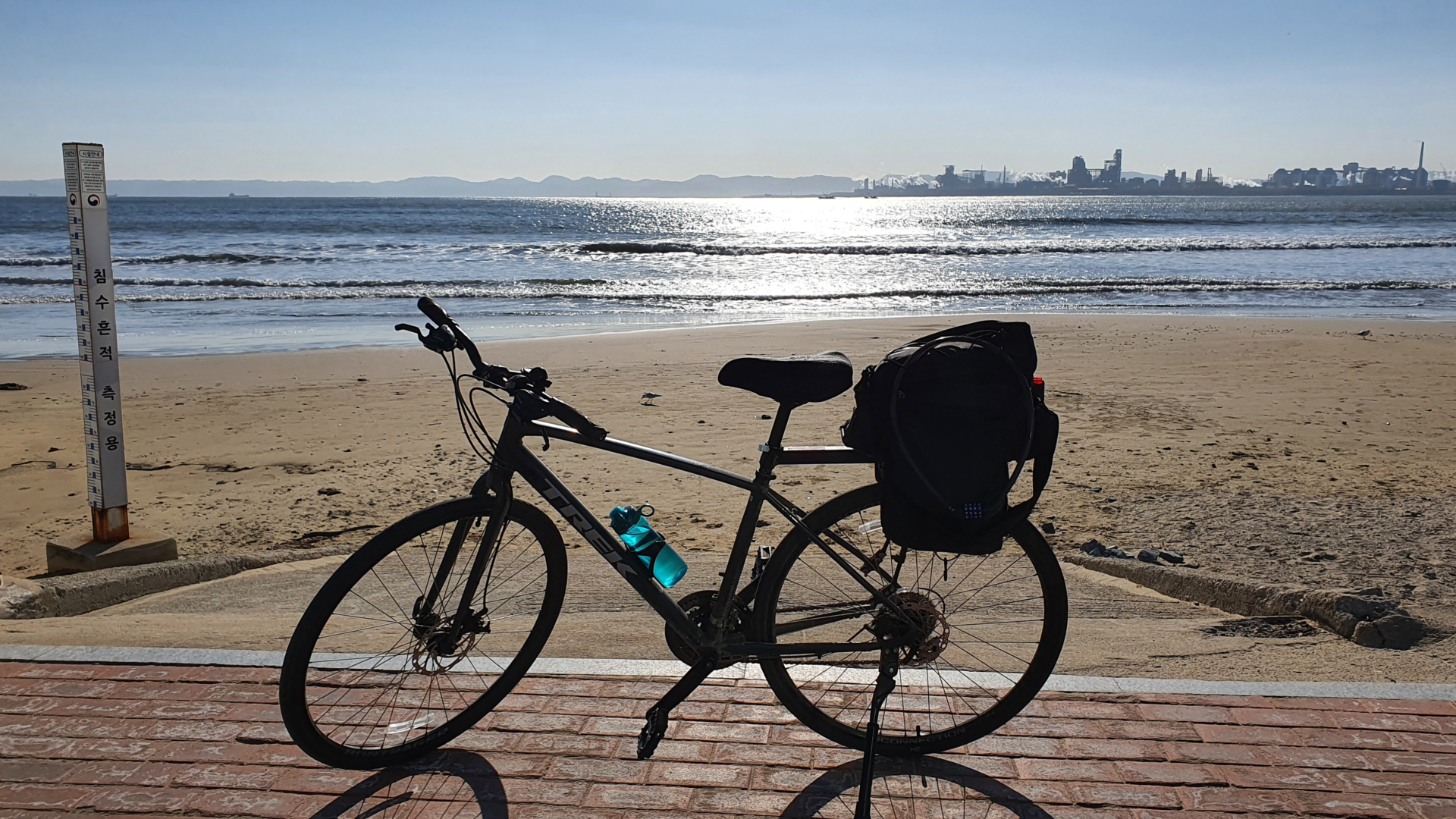 Bicycle with saddle bag on beach
